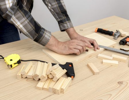 skilled-carpenter-worker-using-his-tools-wood